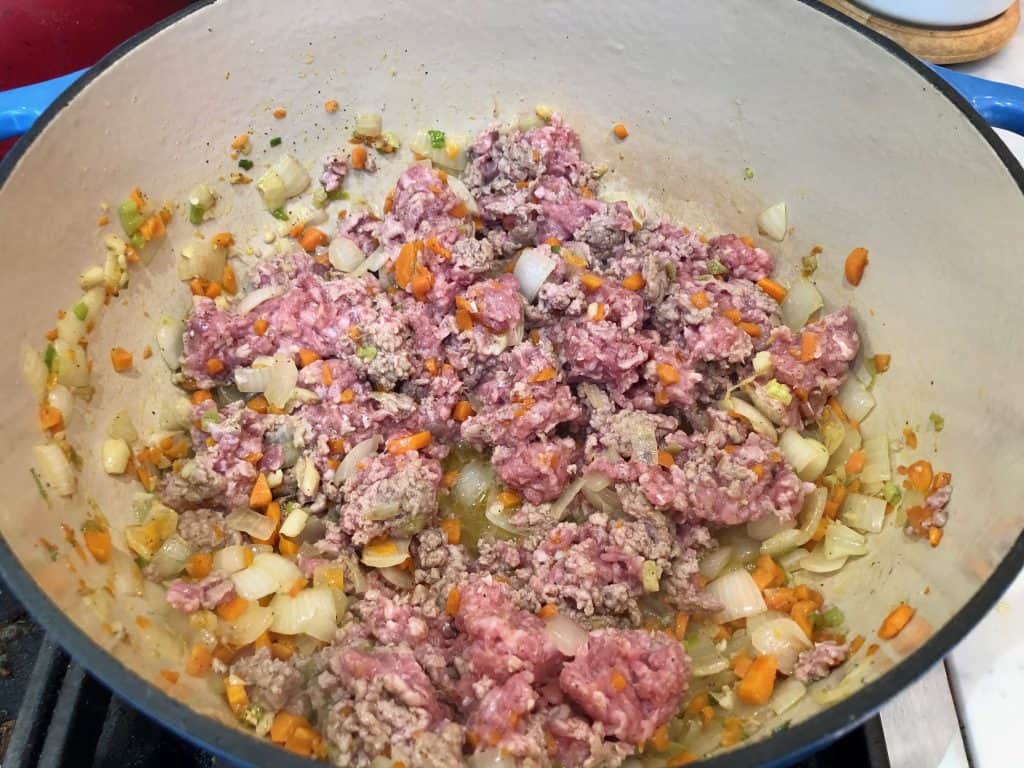 Ground pork and vegetables cooking