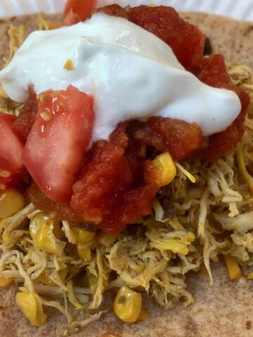 Shredded tumeric chicken tacos