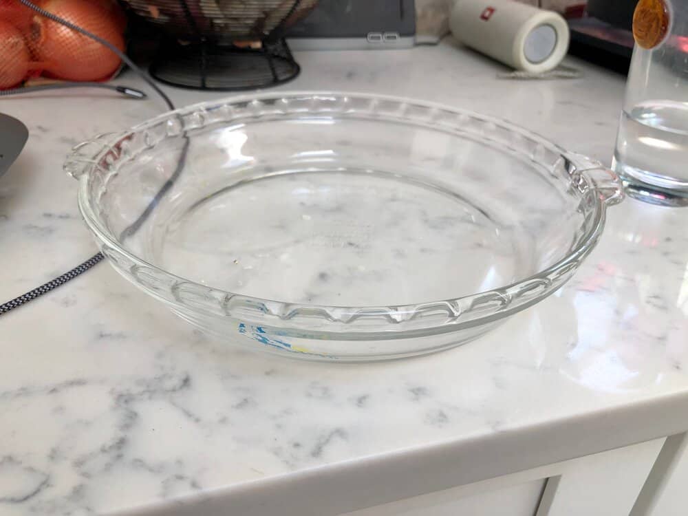 A Pyrex pie plate sitting on the counter