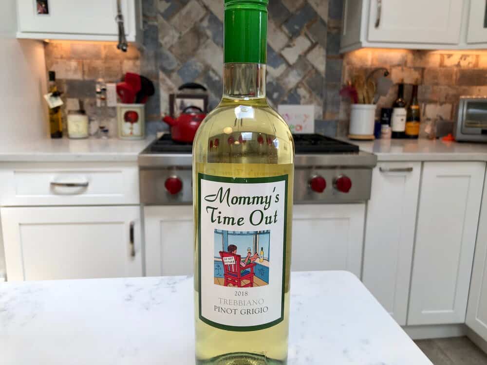 A bottle of wine on the counter