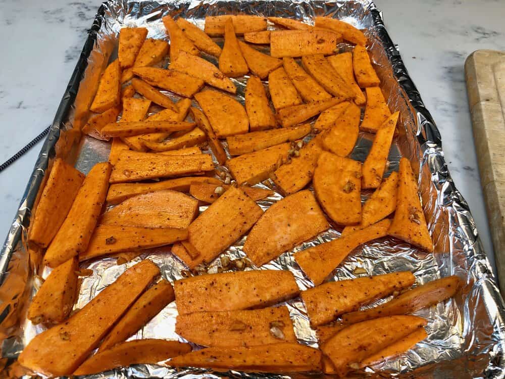 Sweet potato fries on a baking sheet