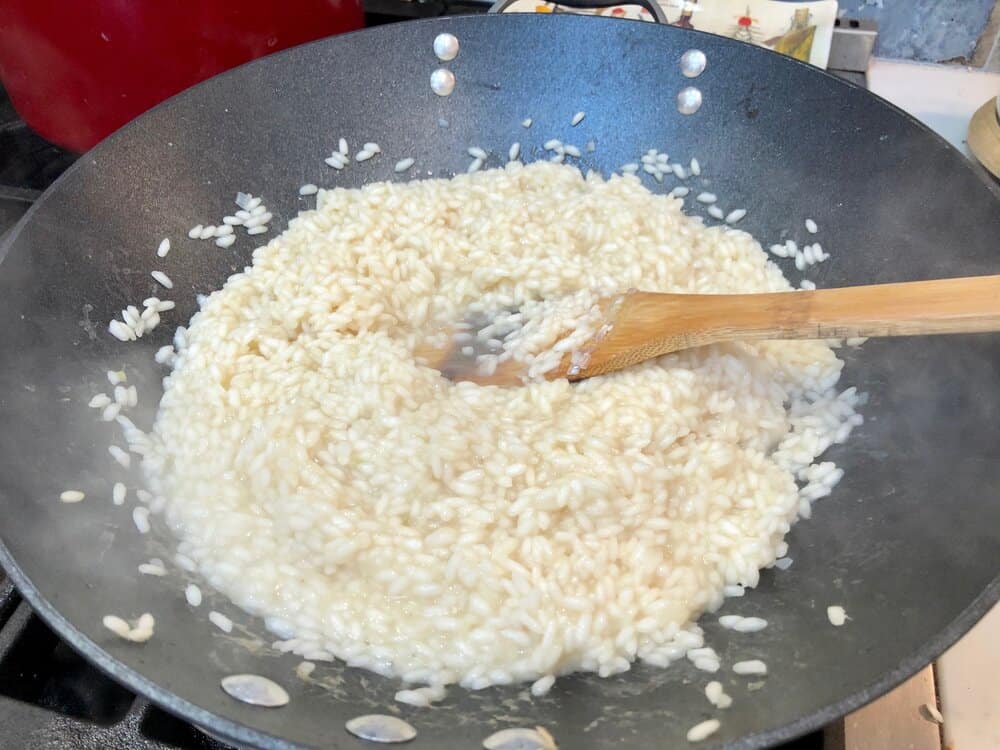 Risotto cooking in a wok