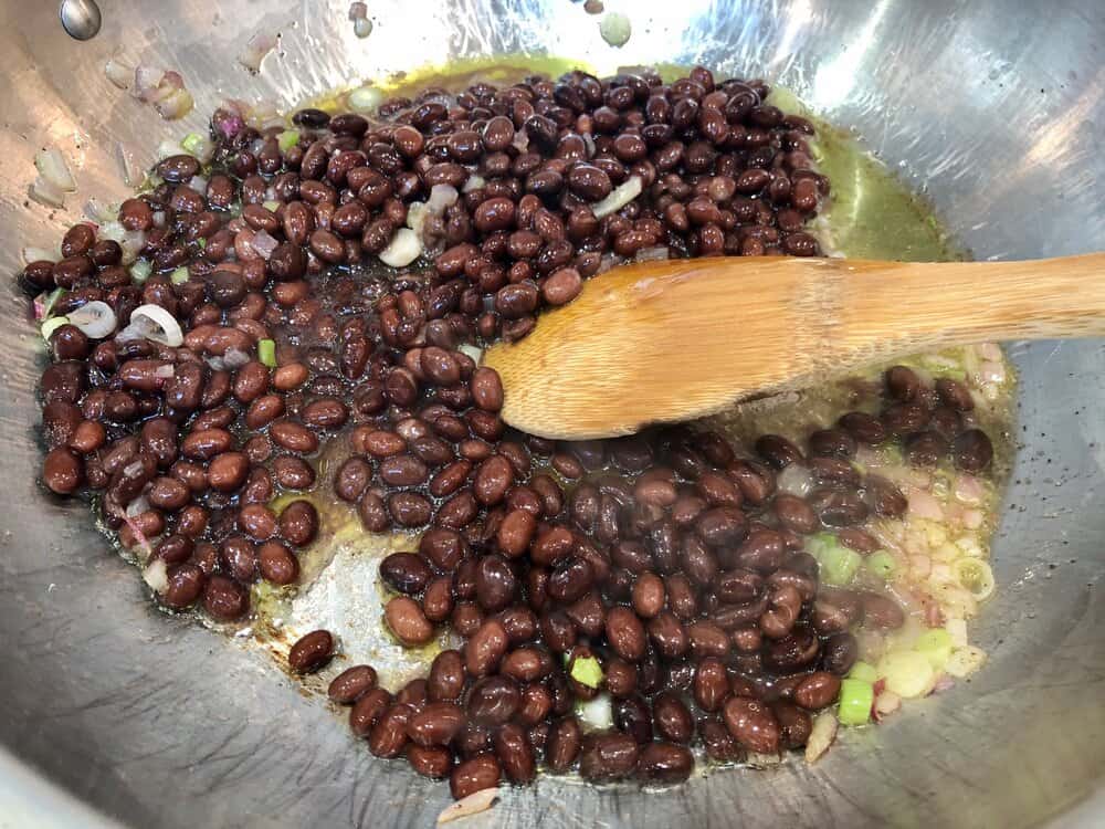 Black beans cooking in a pan