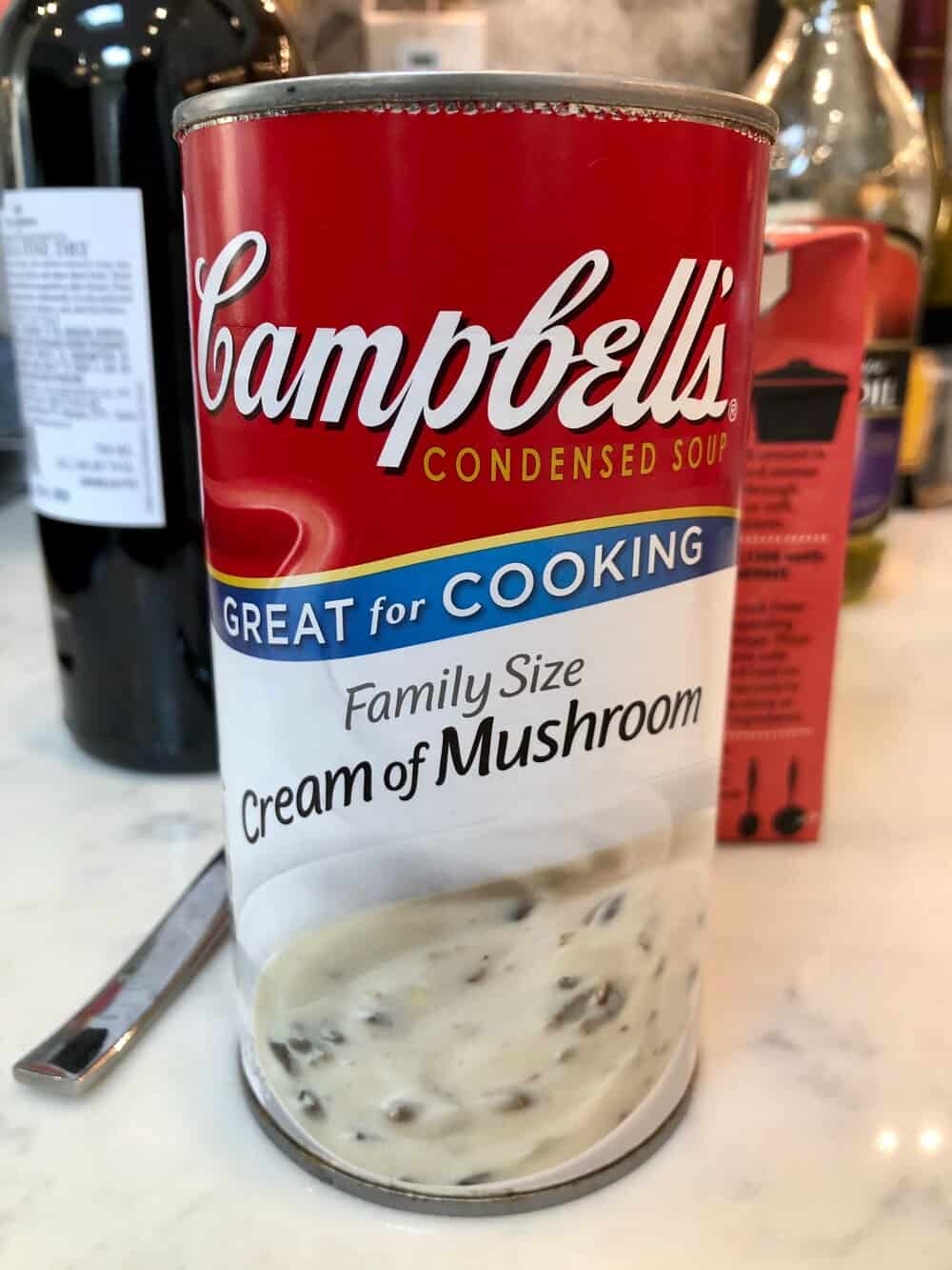 A can of Campbell's cream of mushroom soup