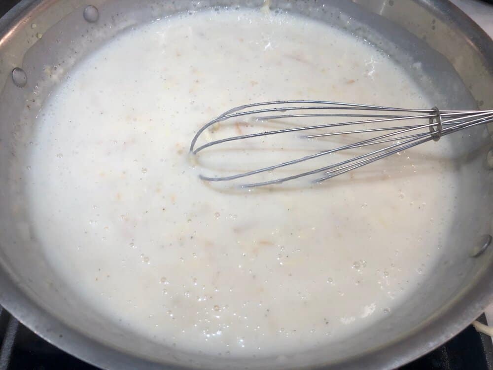 Bechamel sauce in a skillet