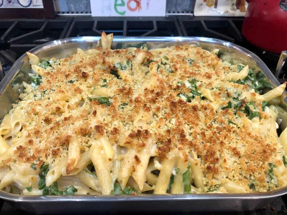 Baked penne and kale in a baking pan