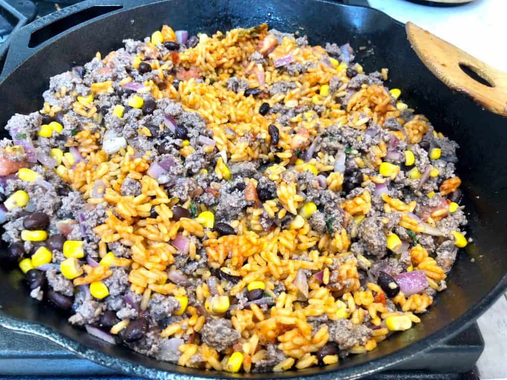 Spanish rice with ground beef in skillet