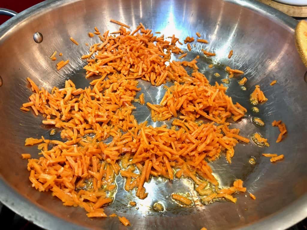 Carrots cooking in a pan