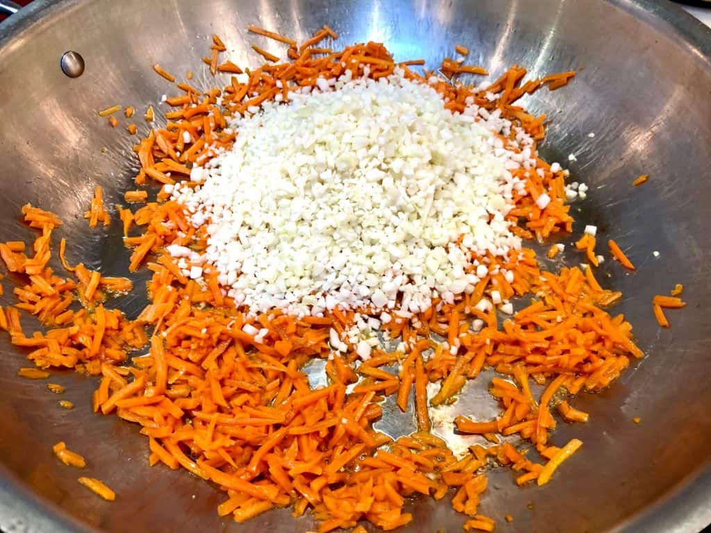 Carrots and riced cauliflower cooking