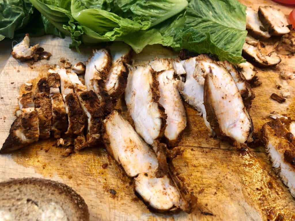 Carved chicken on a cutting board