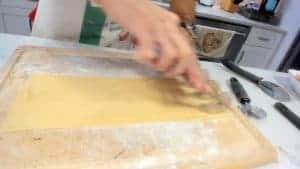 Cutting pasta dough with a bicicletta