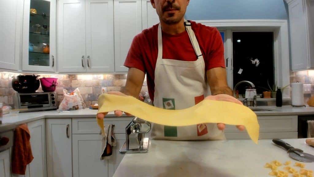 A long sheet of homemade pasta dough
