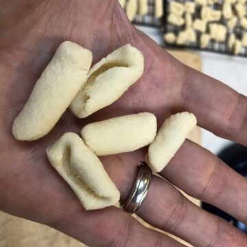 homemade cavatelli in the palm of a hand