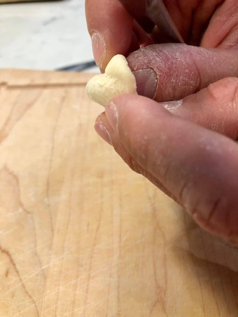 Forming dough into homemade Orecchiette