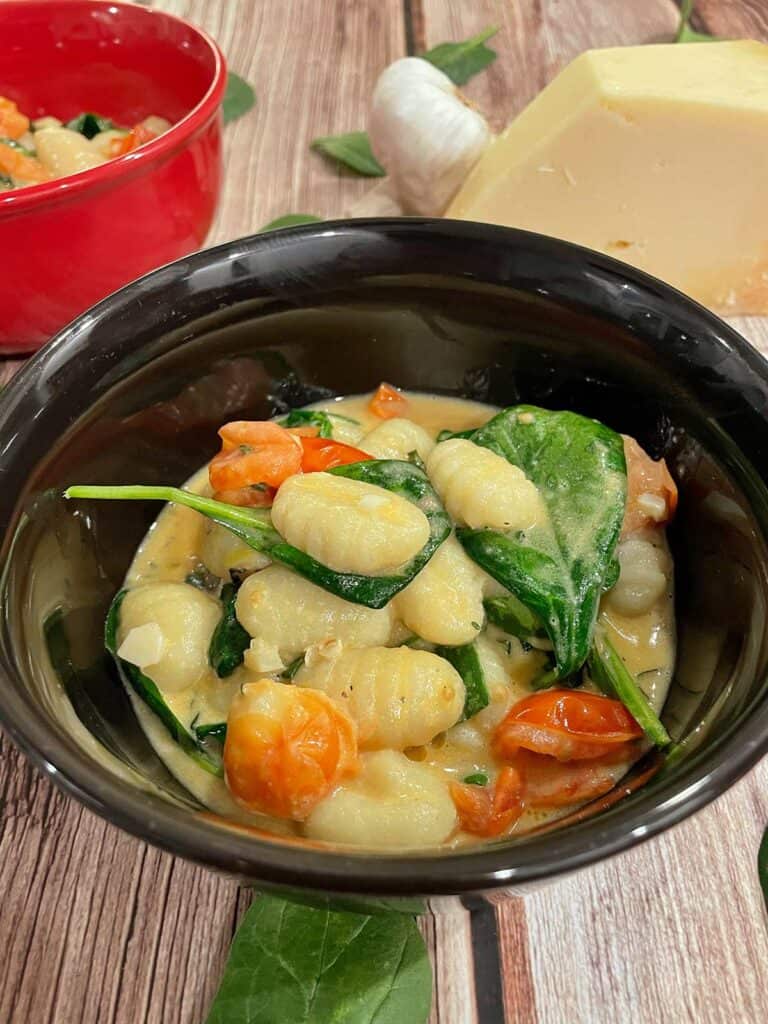 Creamy Spinach Gnocchi with Basil & Cherry Tomatoes - The Skinny Guinea
